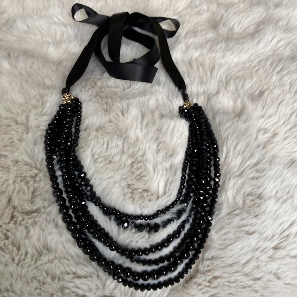 Black multi-strand beaded necklace